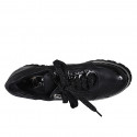 Woman's laced shoe with zipper in black leather and patent leather wedge heel 4 - Available sizes:  44
