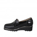 Woman's mocassin with accessory, elastic bands and removable insole in black patent leather and leather wedge heel 4 - Available sizes:  45
