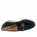 Woman's moccasin shoe with silver accessory and removable insole in black pierced leather and black patent leather wedge heel 4 - Available sizes:  31