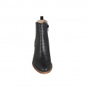 Woman's ankle boot with zipper and elastic band in black pierced leather with heel 7 - Available sizes:  42