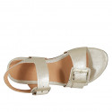Woman's sandal with adjustable buckles in platinum laminated leather heel 2 - Available sizes:  32, 45