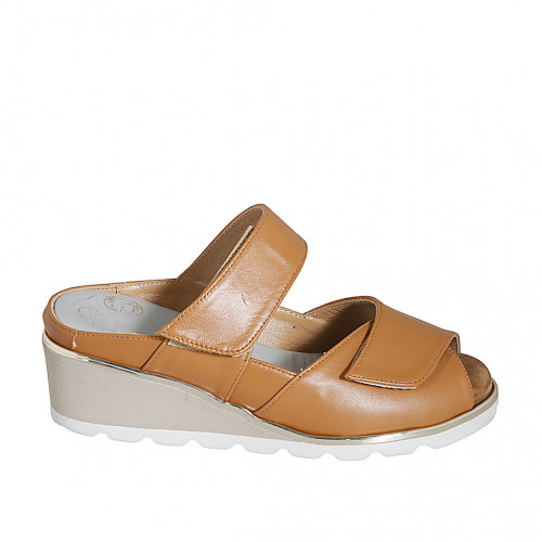 Woman's mules in cognac brown leather...