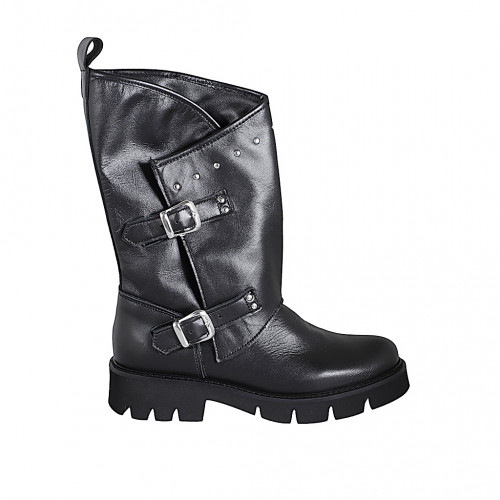 Woman's boot with double buckles and...
